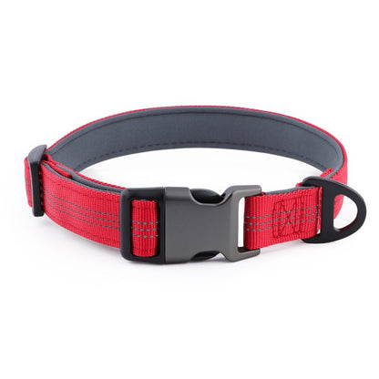 Dog collar with red strap and black buckle on a white background